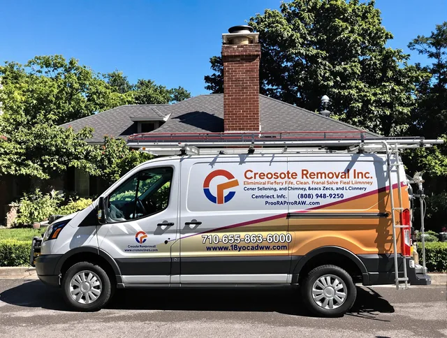 Hanover Chimney Sweep technician removing creosote safely in Hanover, MA